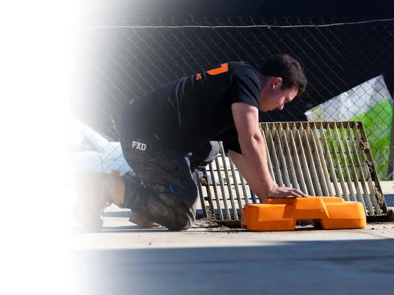 Central Vic Jetting technicians jetting a blocked stormwater drain and pit at a Bendigo property